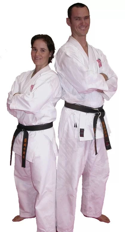 Martin and Sandra Phillips, founders of Sunshine Coast Karate, in their gi and black belts