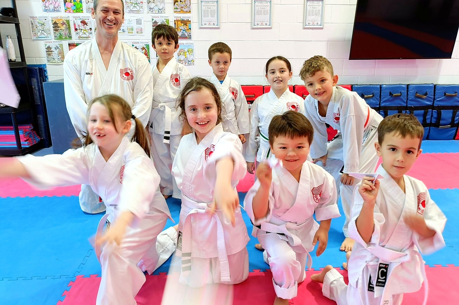 Sensei Martin with a group of young students in the dojo